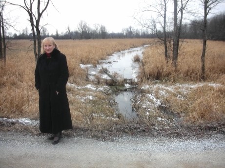Arlene Stafford-Wilson at the creek behind Stafford House
