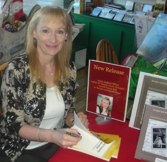 Arlene Stafford-Wilson signing books